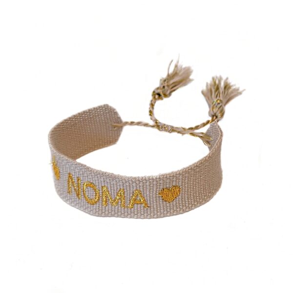 Knyte armbånd med dusker Noma – lys beige/gull