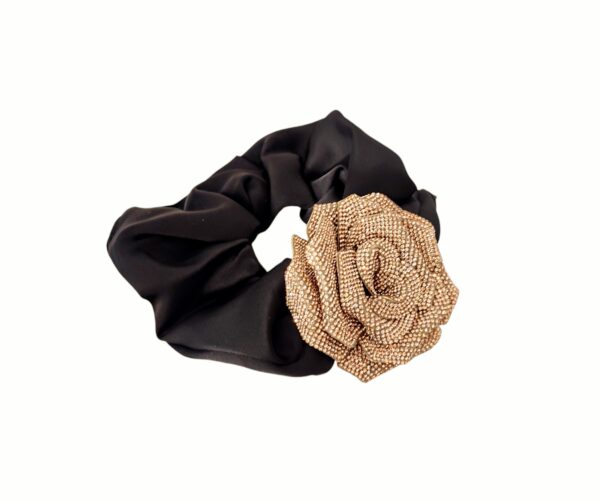 Exclusive hårstrikk med strass blomst – Champagne/sort