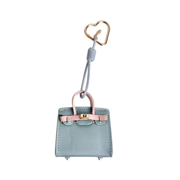 Bag charm veske SALG – Lys blå/lys rosa